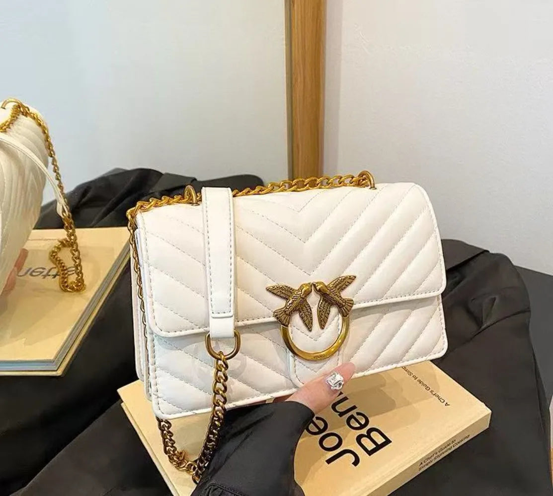 Golden Dove Quilted Shoulder Bag