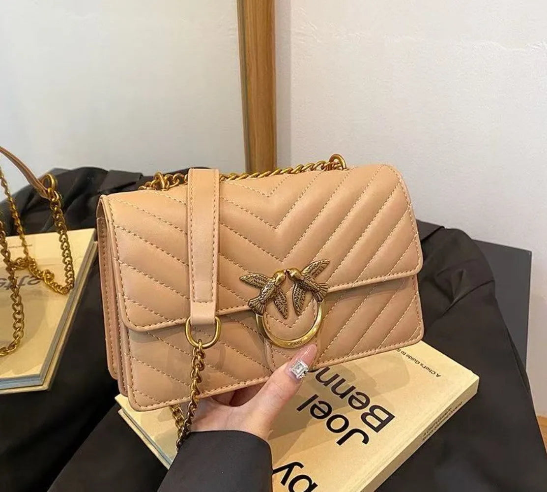 Golden Dove Quilted Shoulder Bag