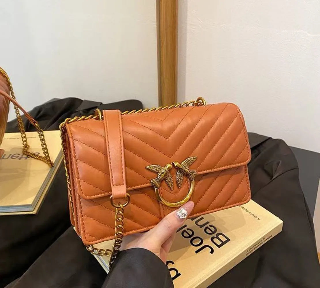 Golden Dove Quilted Shoulder Bag